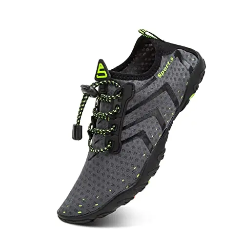 YALOX water shoes being worn while walking on a sandy beach