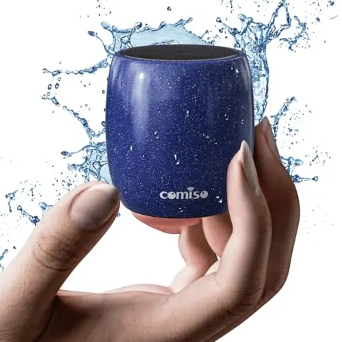 Comiso small Bluetooth speaker hanging from a backpack during hiking